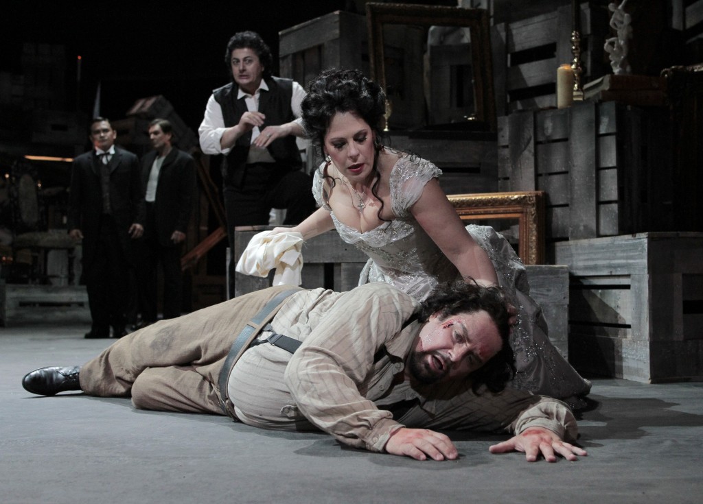 Sondra Radvanovsky as Tosca and Marco Berti as Cavaradossi, with Lado Ataneli as Scarpia. Photo: Robert Millard 