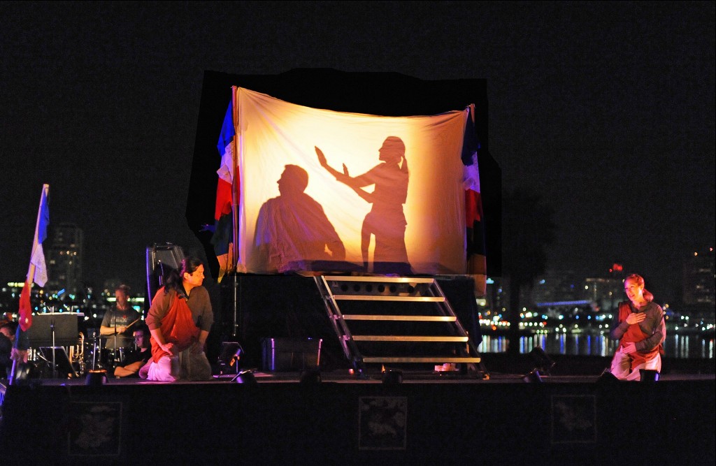 Gomez and Bond, with Gonzalez and Ray in silhouette. Photo by Keith Ian Polakoff.