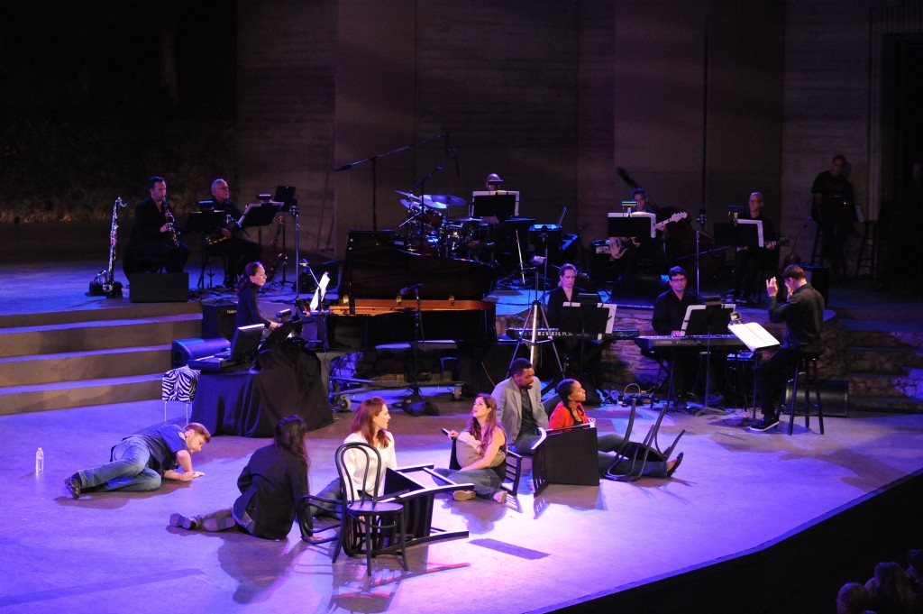 Some cast members and the band conducted by Andreas Mitisek. Photo by Keith Ian Polakoff.